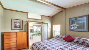 A bedroom with a bed, a wooden dresser, and a window with blinds. - Hermosa Home w/ Deck: 2 Mi to Custer State Park! (Hermosa)