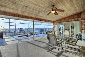 Outdoor dining - Bayfront Palmetto Retreat With Pool, Spa & Dock! (Palmetto)