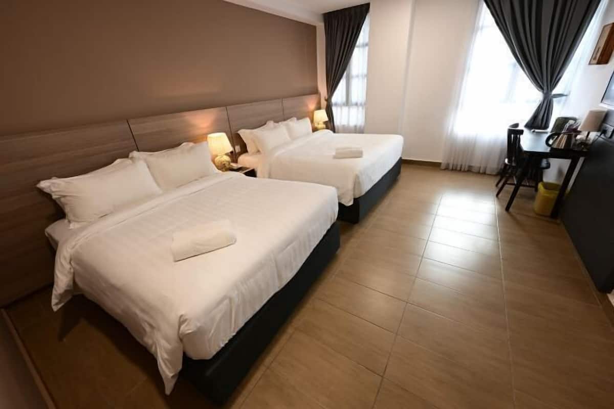 Pillowtop beds, desk, laptop workspace, blackout drapes