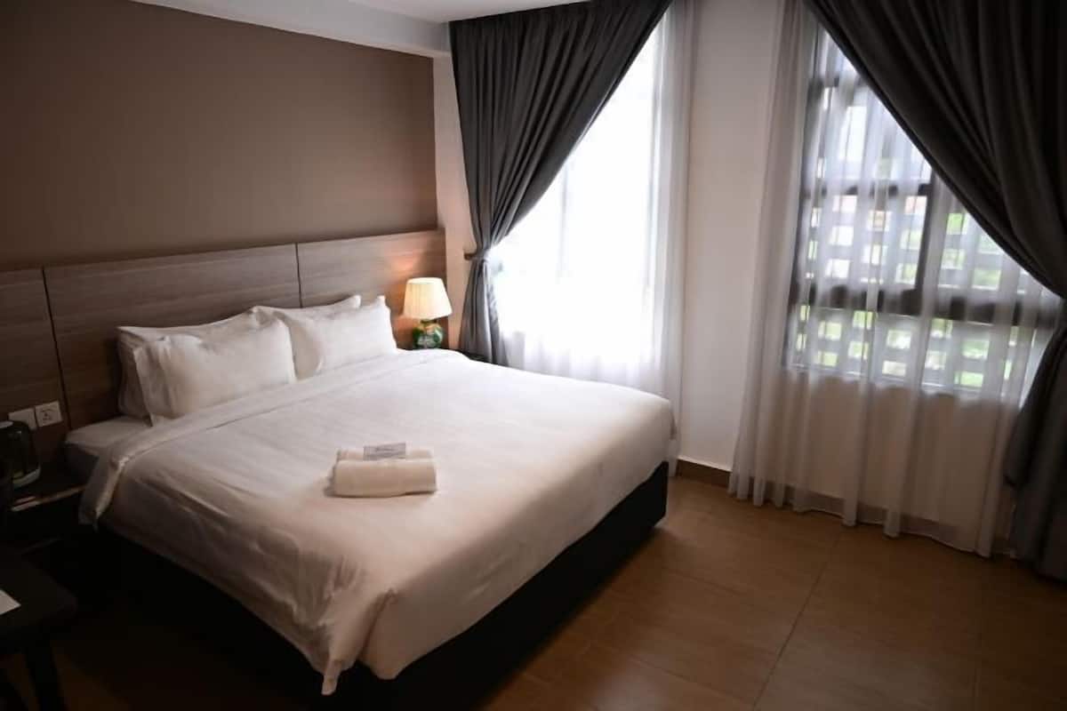 Pillowtop beds, desk, laptop workspace, blackout drapes