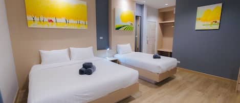Exclusive Triple Room | 1 bedroom, desk, laptop workspace, blackout drapes