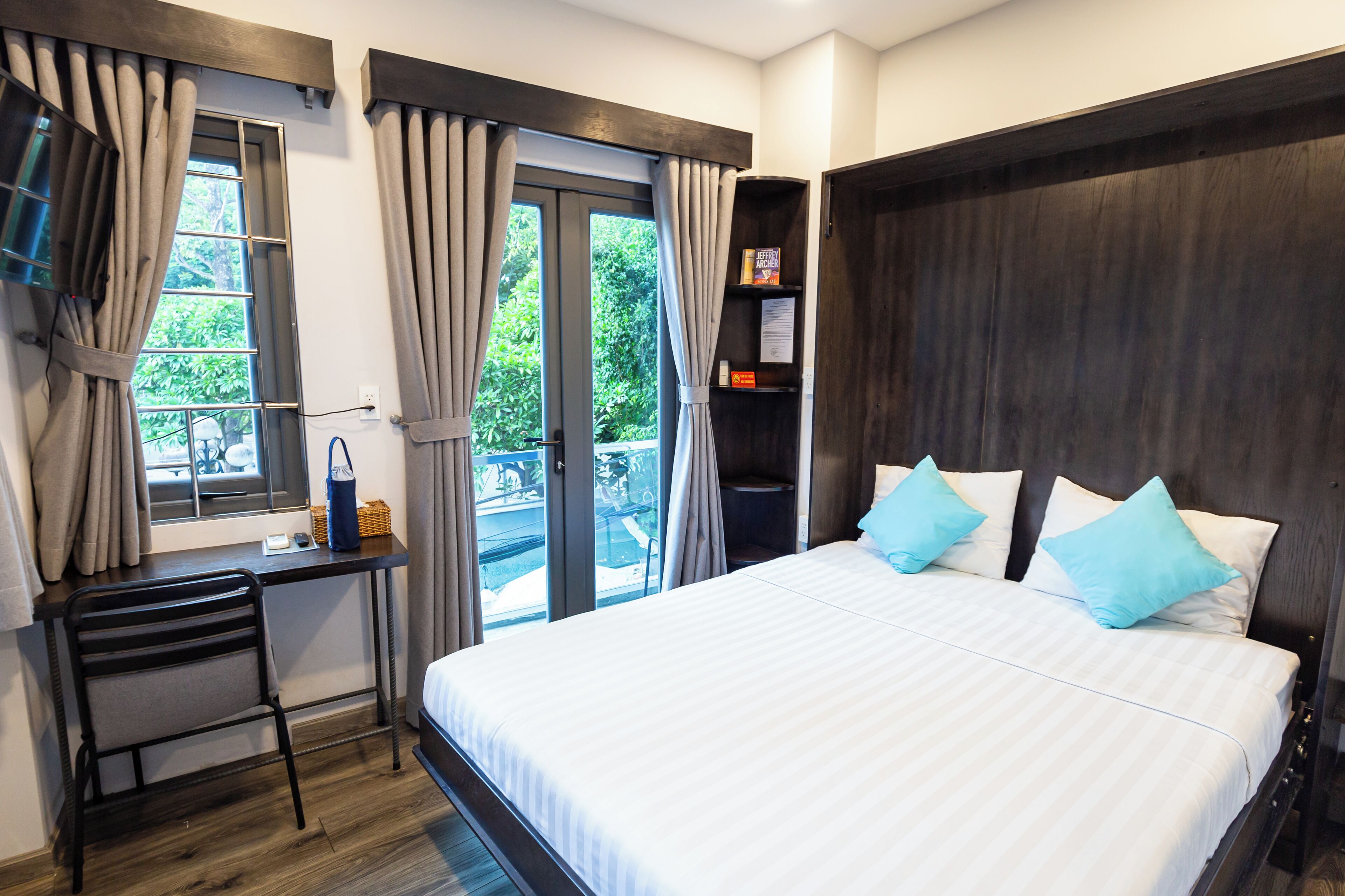 Comfort studio | Select Comfort-bedden, een minibar, individueel gedecoreerd