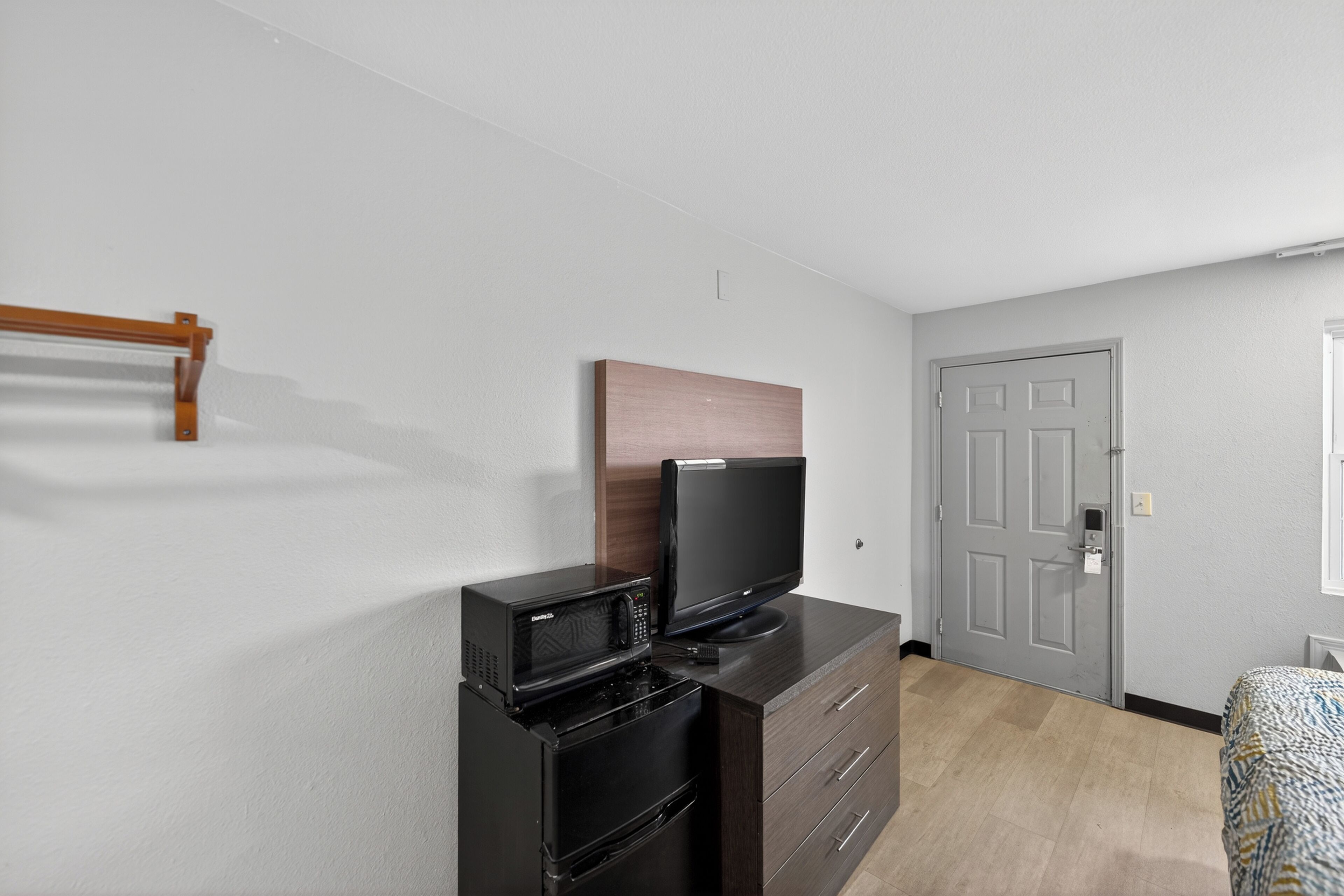 Premium bedding, pillowtop beds, laptop workspace, blackout drapes