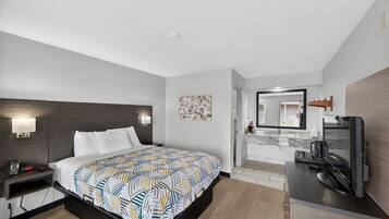 Premium bedding, pillowtop beds, laptop workspace, blackout drapes