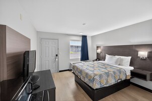 Premium bedding, pillowtop beds, laptop workspace, blackout drapes