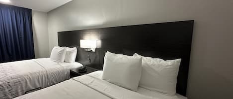 Deluxe Room, 2 Queen Beds, Smoking, Refrigerator & Microwave | Laptop workspace, blackout drapes, iron/ironing board, free WiFi