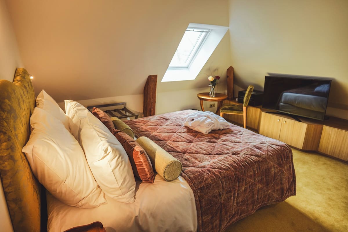 1 chambre, literie de qualité supérieure, couette en duvet d'oie