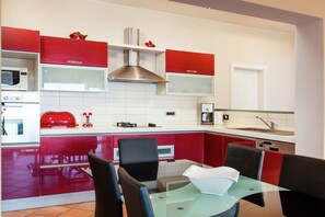 Fridge, oven, dishwasher, dining tables