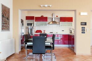 Fridge, oven, dishwasher, dining tables