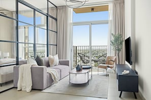 Royal Apartment | Living area | 50-inch Smart TV with digital channels, TV