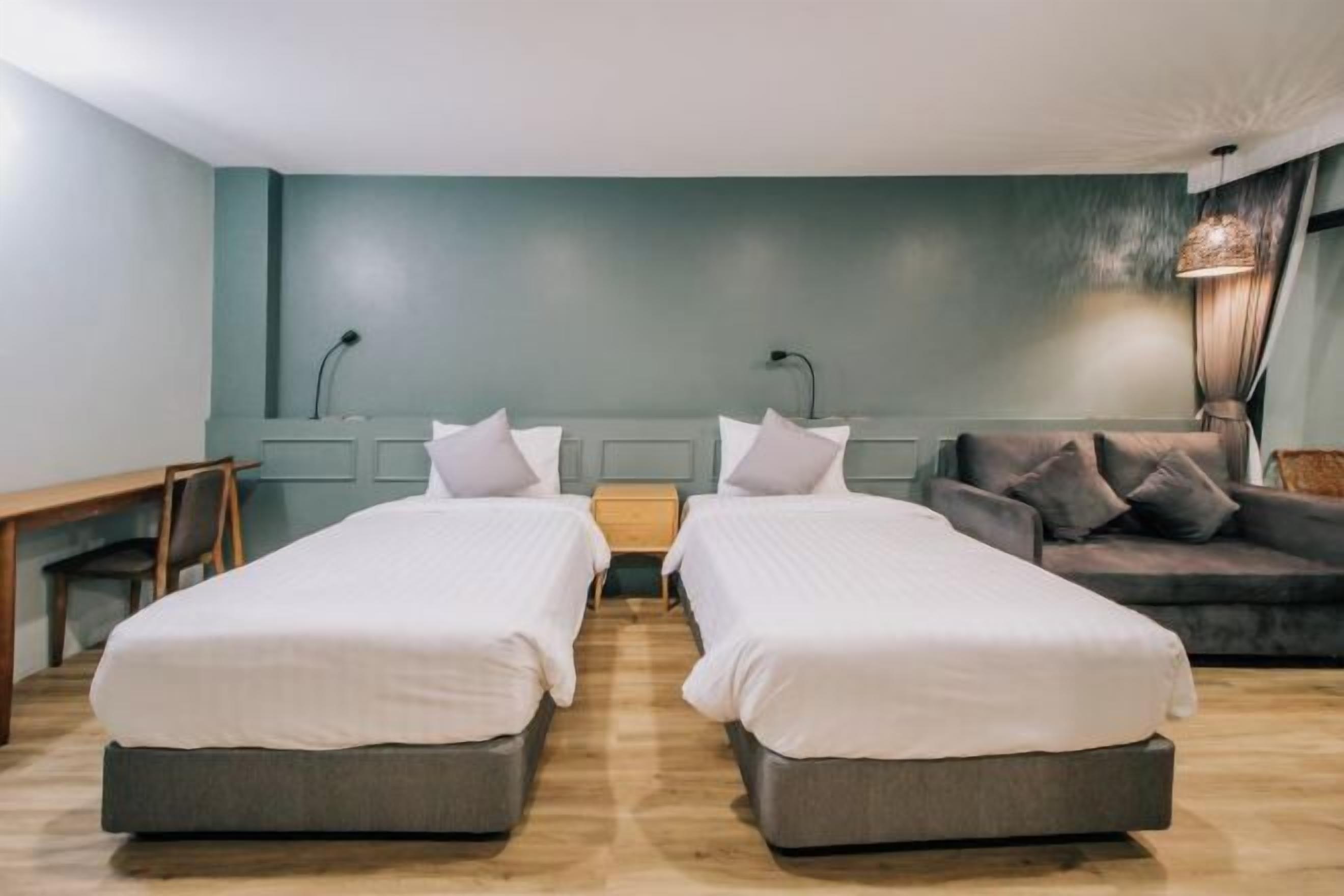 Desk, laptop workspace, free WiFi, bed sheets