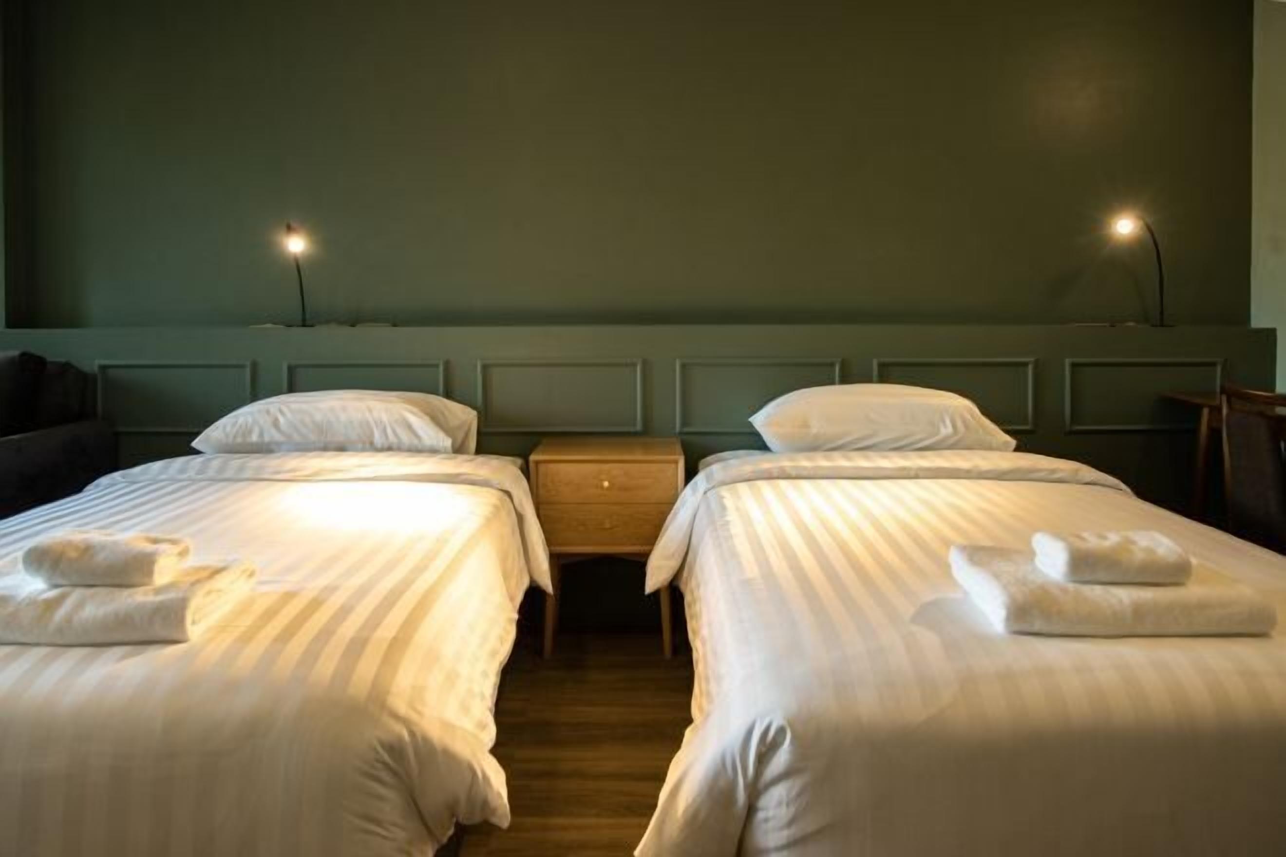 Desk, laptop workspace, free WiFi, bed sheets