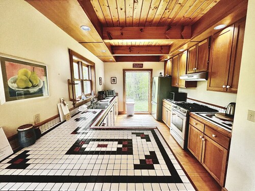 Spacious home Featuring a hot tub, fire pit, fireplace and more!