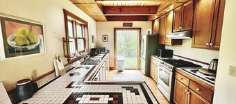 Spacious home Featuring a hot tub, fire pit, fireplace and more!