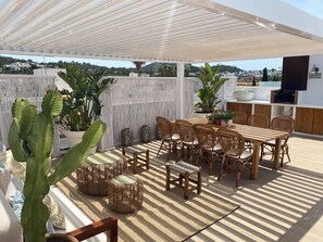 Outdoor dining - Stunning penthouse with private pool and barbeque in Jesús (ibiza)