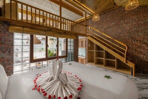 Familie loft | Luxe beddengoed, een minibar, een laptopwerkplek, geluiddichte muren