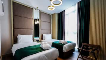 Chambre Deluxe avec lits jumeaux | Literie de qualité supérieure, minibar, coffres-forts dans les chambres