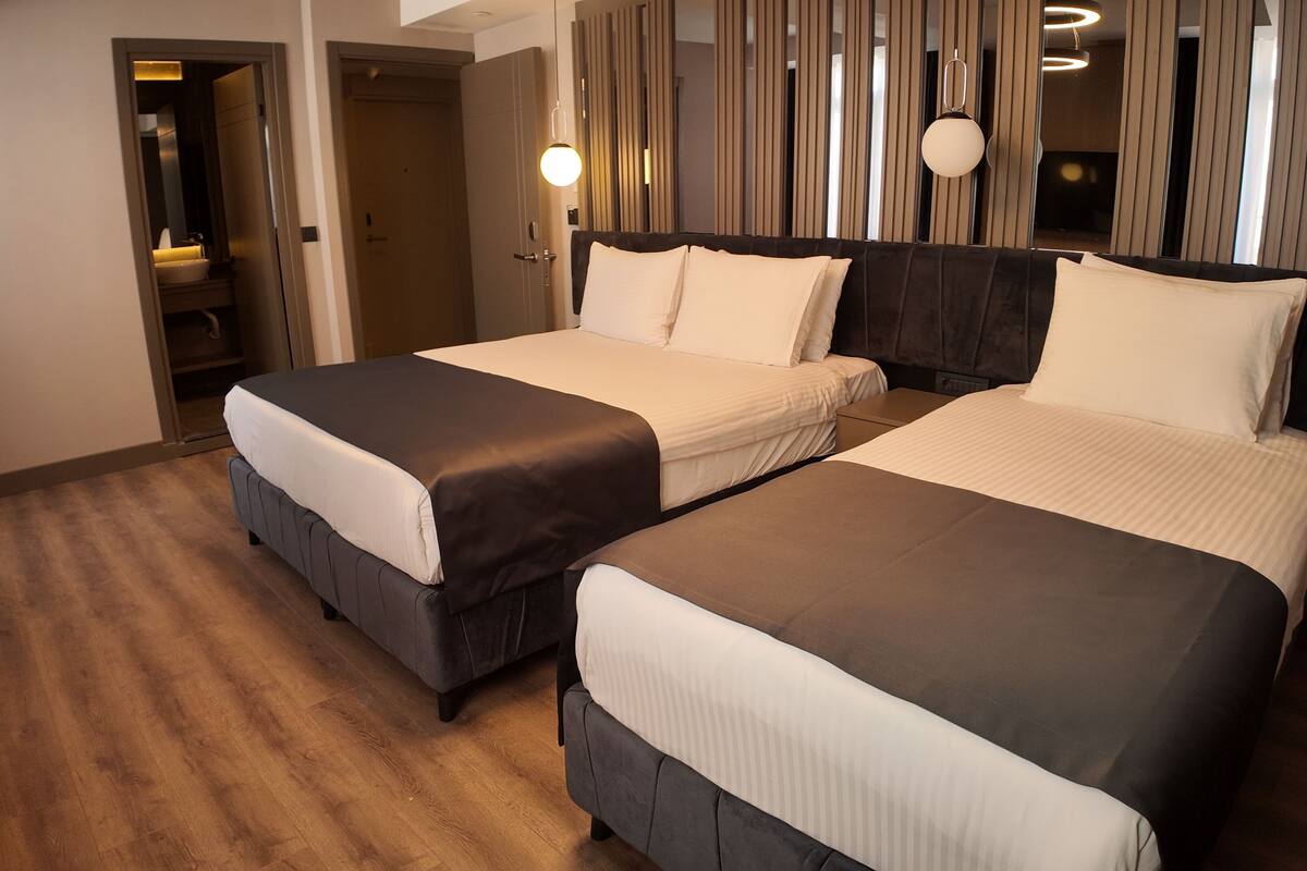Chambre Triple Deluxe | 1 chambre, literie de qualité supérieure, minibar
