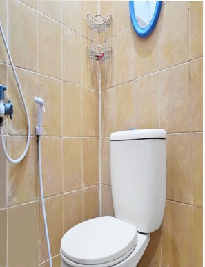 Standard Double Room | Bathroom | Shower, towels, soap, toilet paper