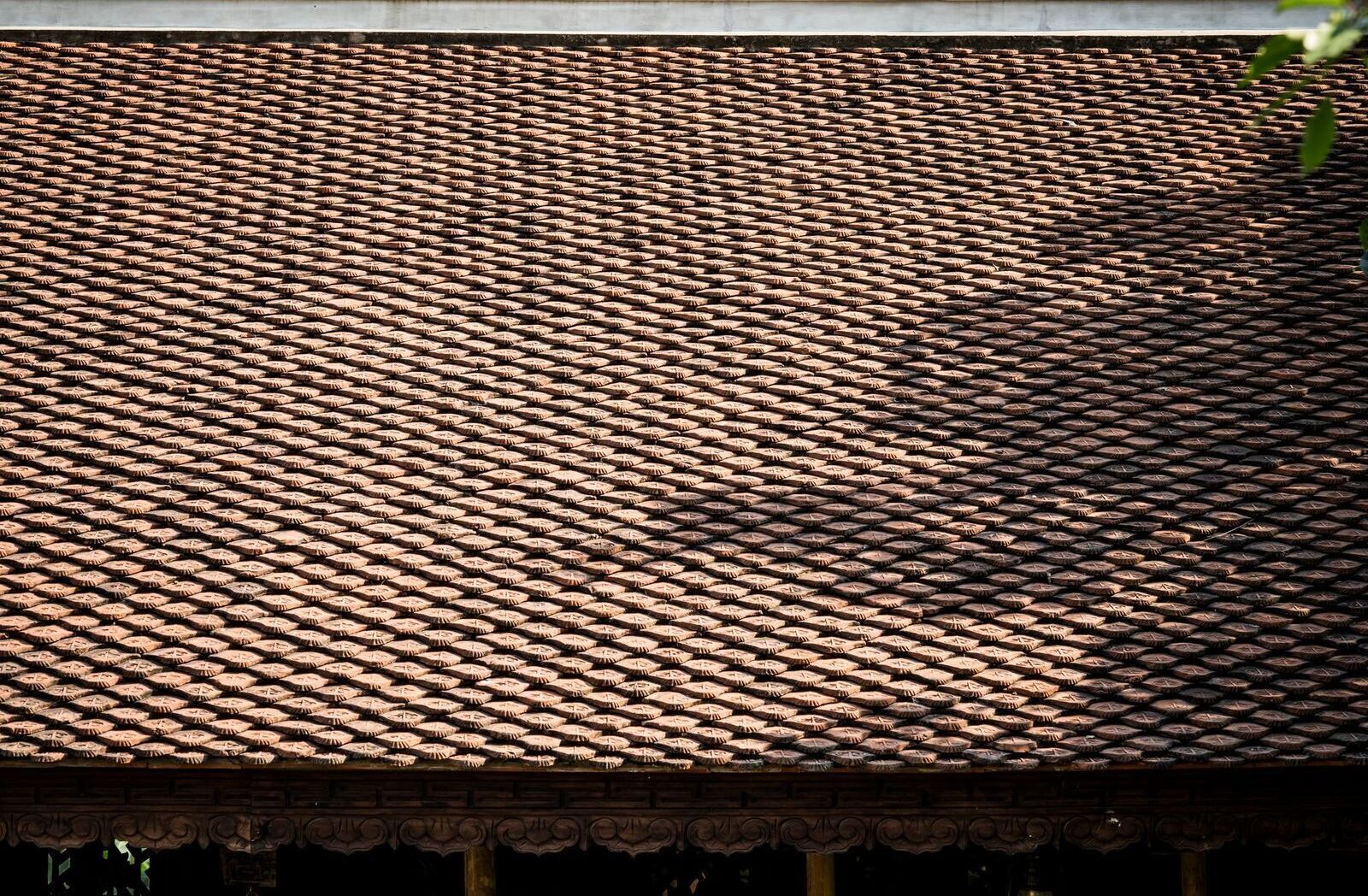 A traditional tiled roof with a patterned design.