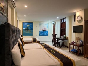 Family Room | Minibar, desk, blackout drapes, soundproofing