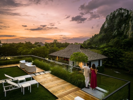 Outdoor pool, open 7:00 AM to 7:00 PM, pool umbrellas. The Soul Resort