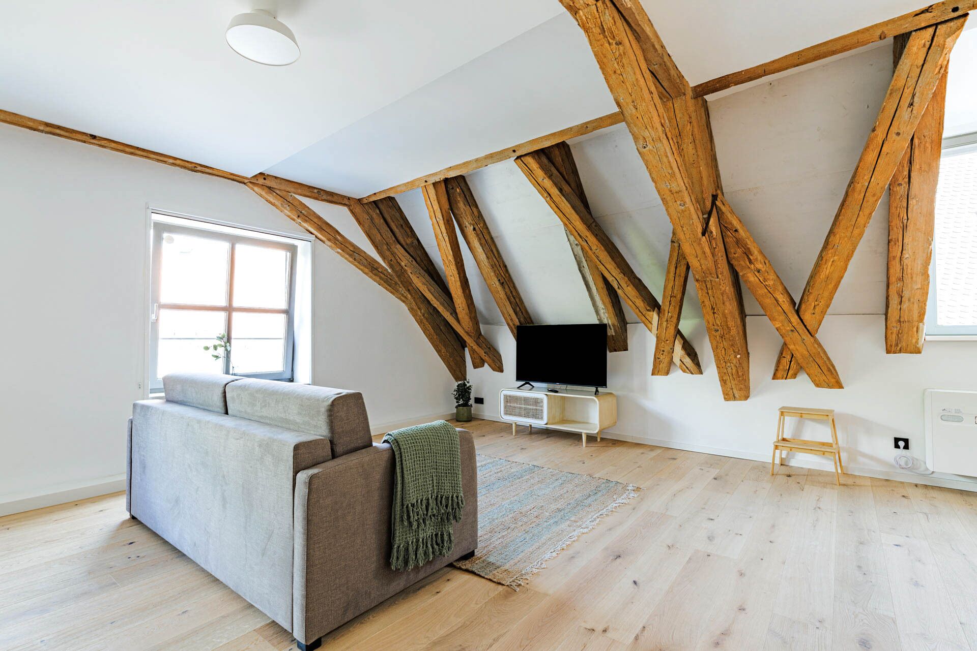 One-Bedroom Comfort Suite | Living area | 50-inch TV with satellite channels