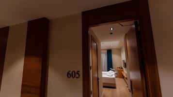 Premium bedding, down duvets, memory-foam beds, in-room safe