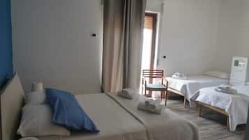 Classic Quadruple Room | Pillow-top beds, travel cot, free WiFi