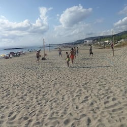 On the beach, white sand, 2 beach bars