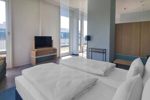 Suite, 1 Schlafzimmer, Nichtraucher | 1 Schlafzimmer, Zimmersafe, Bügeleisen/Bügelbrett, kostenlose Babybetten