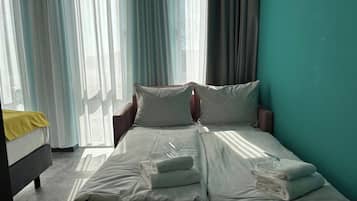 In-room safe, desk, laptop workspace, blackout drapes
