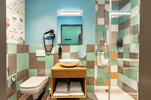 Shower, eco-friendly toiletries, hair dryer, towels