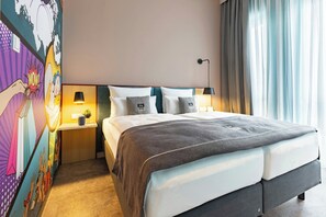 In-room safe, desk, laptop workspace, blackout drapes - Holiday Inn - the niu, Pax Berlin Airport by IHG (Schoenefeld)