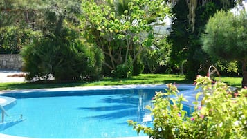 Indoor pool, seasonal outdoor pool, pool umbrellas, sun loungers