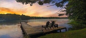 Lakefront 3BR, 2BA cottage with dock, boat, and fire pit