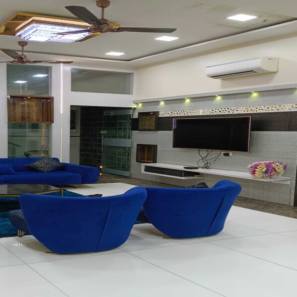 Luxury Villa | Living area | 32-inch LED TV with satellite channels, TV - The Diplomat Villa (Mumbai)