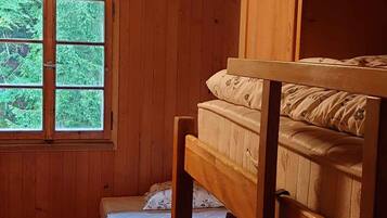 Travel cot, bed sheets