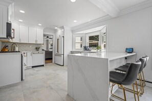 Fridge, microwave, oven, stovetop - Updated home with canal & hot tub in backyard. Close to everything! (Oakdale)