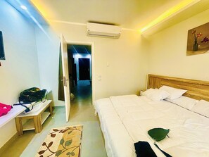 1 chambre, fer et planche à repasser, accès au Wi-Fi (inclus)