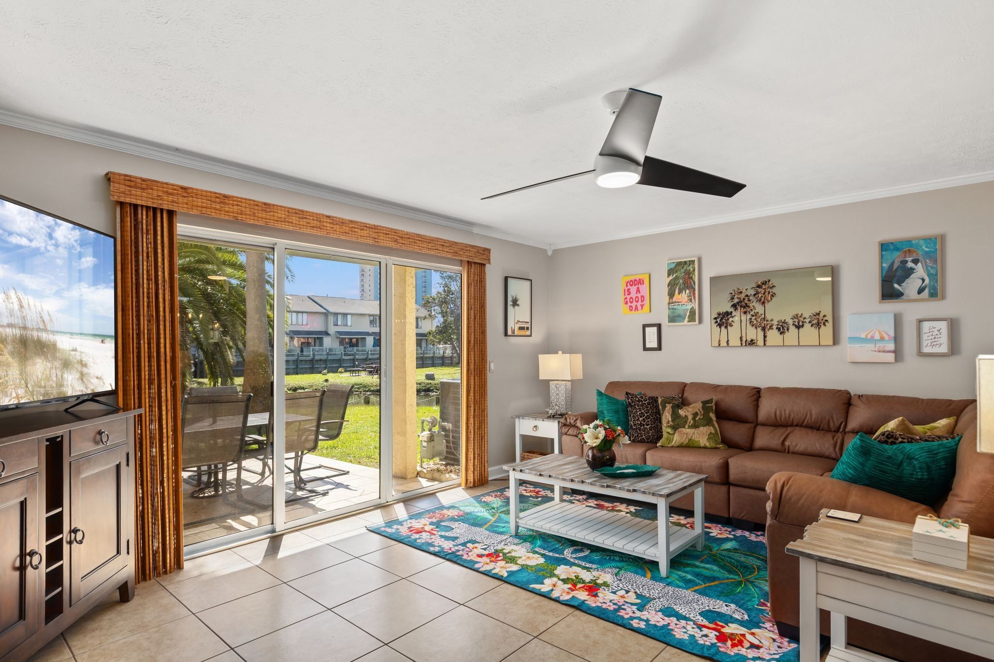 Open concept living area with stylish furnishings and costal decor throughout