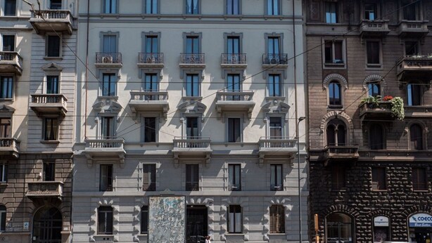A multi-story building with a classical architectural style, featuring balconies and large windows. - The Best Rent - Two bedroom apartment close to Sondrio metro station (Milano)