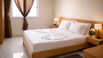 Basic Double Room, 1 Queen Bed | Individually decorated, desk, laptop workspace, soundproofing