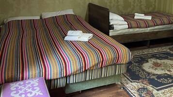Traditional Triple Room | Bed sheets