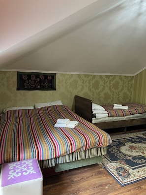 Traditional Triple Room | Bed sheets