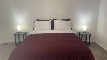 4 chambres, coffres-forts dans les chambres, fer et planche à repasser