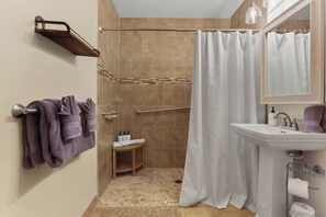 Bathtub, hair dryer, towels