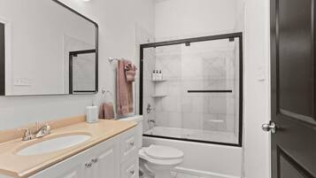 Bathtub, hair dryer, towels