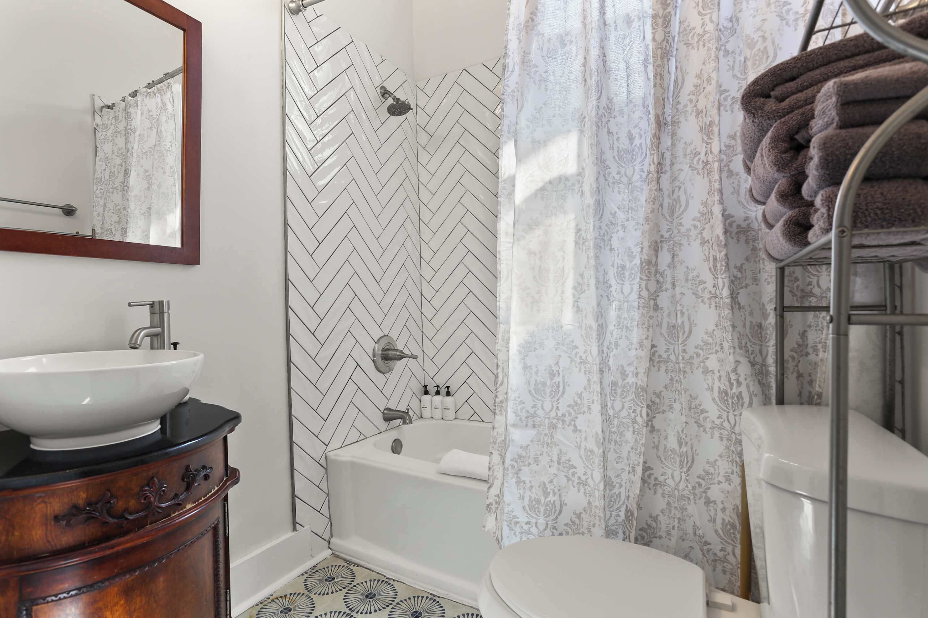 Bathtub, hair dryer, towels