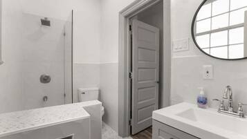 Bathtub, hair dryer, towels